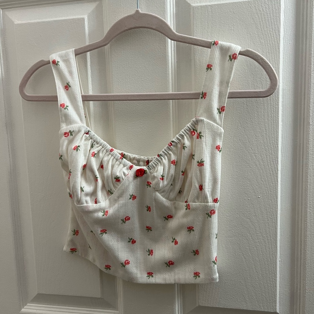 With Jean White Top with Red Floral Accents